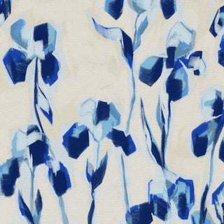 The image is an abstract painting featuring blue and white flowers or plant-like shapes. The painting has a loose, expressive style with bold brushstrokes and a sense of movement.